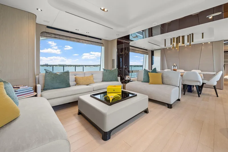 No Name Yacht Photos Pics Luxurious interior of 2022 Azimut Grande 27 METRI yacht with elegant seating and sea view.