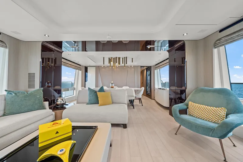 No Name Yacht Photos Pics Luxurious interior of 2022 Azimut Grande 27 METRI yacht with modern furnishings and ocean view.
