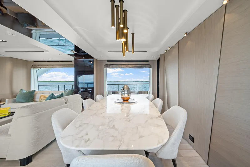 No Name Yacht Photos Pics Luxurious dining area on 2022 Azimut Grande 27 METRI yacht with elegant marble table.