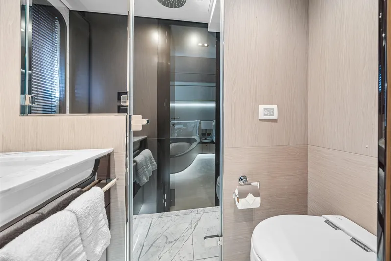 No Name Yacht Photos Pics Luxurious bathroom in 2022 Azimut Grande 27 METRI yacht with modern fixtures and elegant design.
