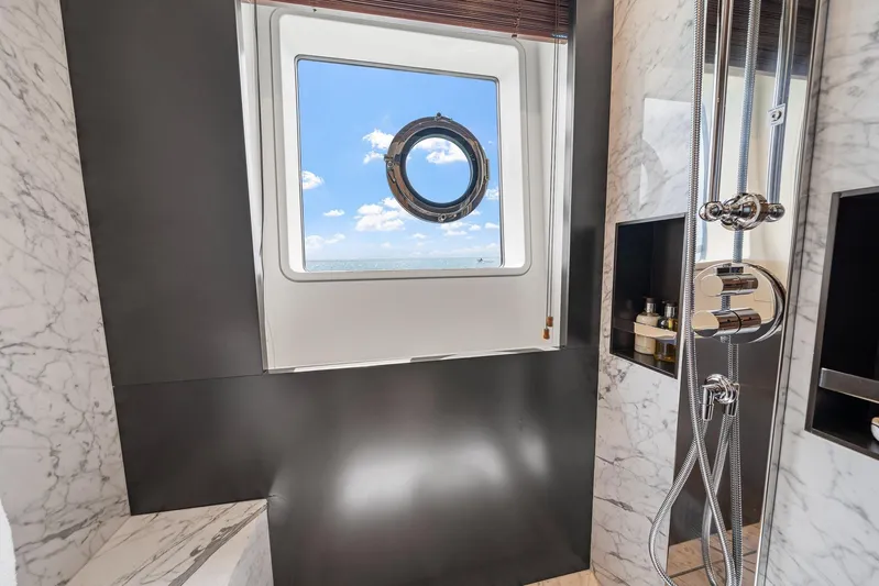 No Name Yacht Photos Pics Luxurious bathroom on 2022 Azimut Grande 27 METRI yacht with marble and ocean view.