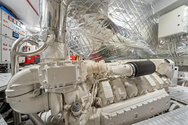 No Name Yacht Photos Pics Engine room of 2022 Azimut Grande 27 METRI yacht, featuring advanced machinery and controls.