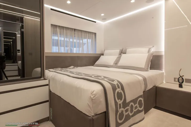  Yacht Photos Pics Luxurious bedroom interior on 2025 MandaYachts 8 SPIDER, featuring modern design and elegant decor.