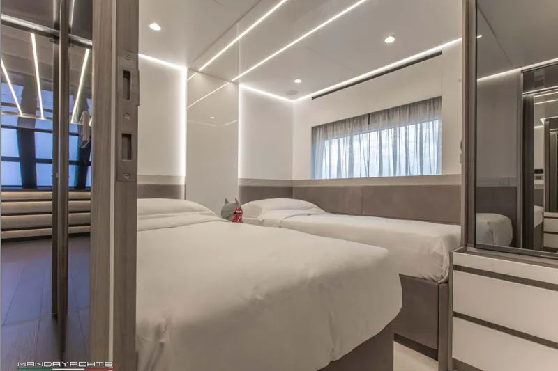  Yacht Photos Pics Modern bedroom interior on 2025 MandaYachts 8 SPIDER, featuring sleek design and ambient lighting.