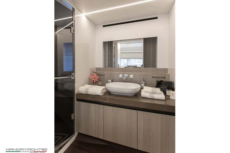  Yacht Photos Pics Luxurious bathroom interior on 2025 MandaYachts 8 SPIDER, featuring modern sink and elegant decor.
