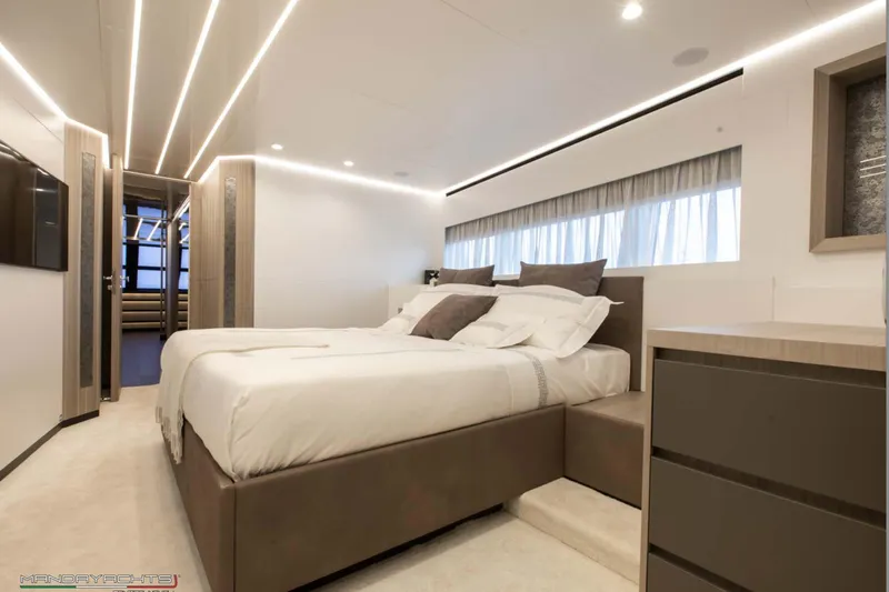  Yacht Photos Pics Luxurious bedroom interior of 2025 MandaYachts 8 SPIDER with modern design and ambient lighting.