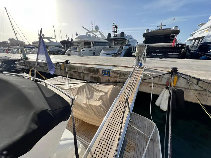 St. Anna Yacht Photos Pics 2016 Sea Ray L650 Fly yacht docked at a marina with other luxury boats.