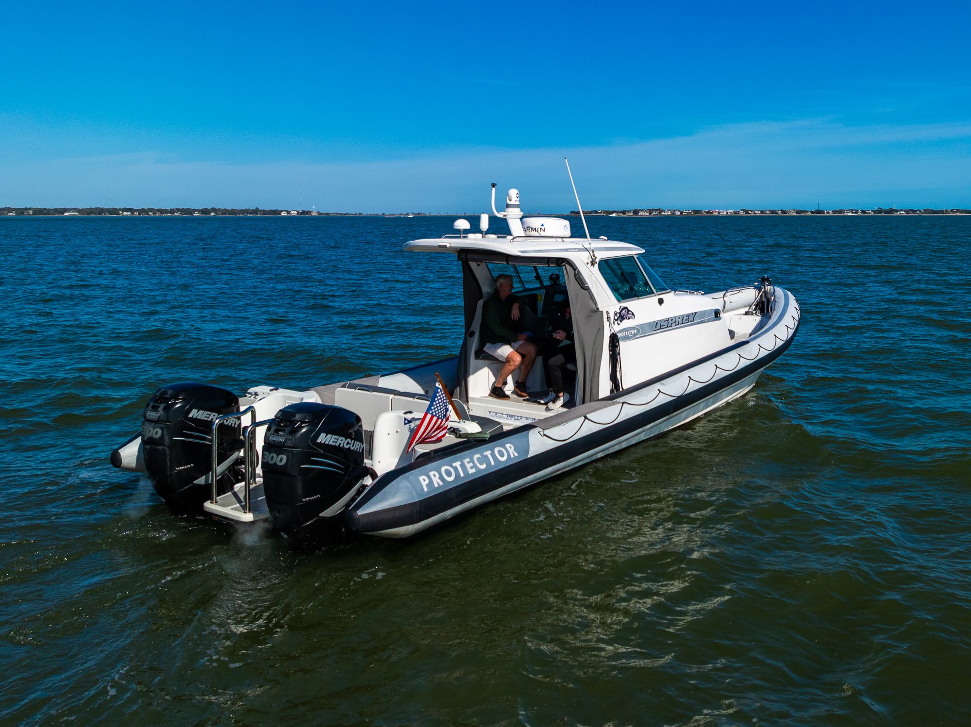 2008 Protector 410 Targa boat on open water.