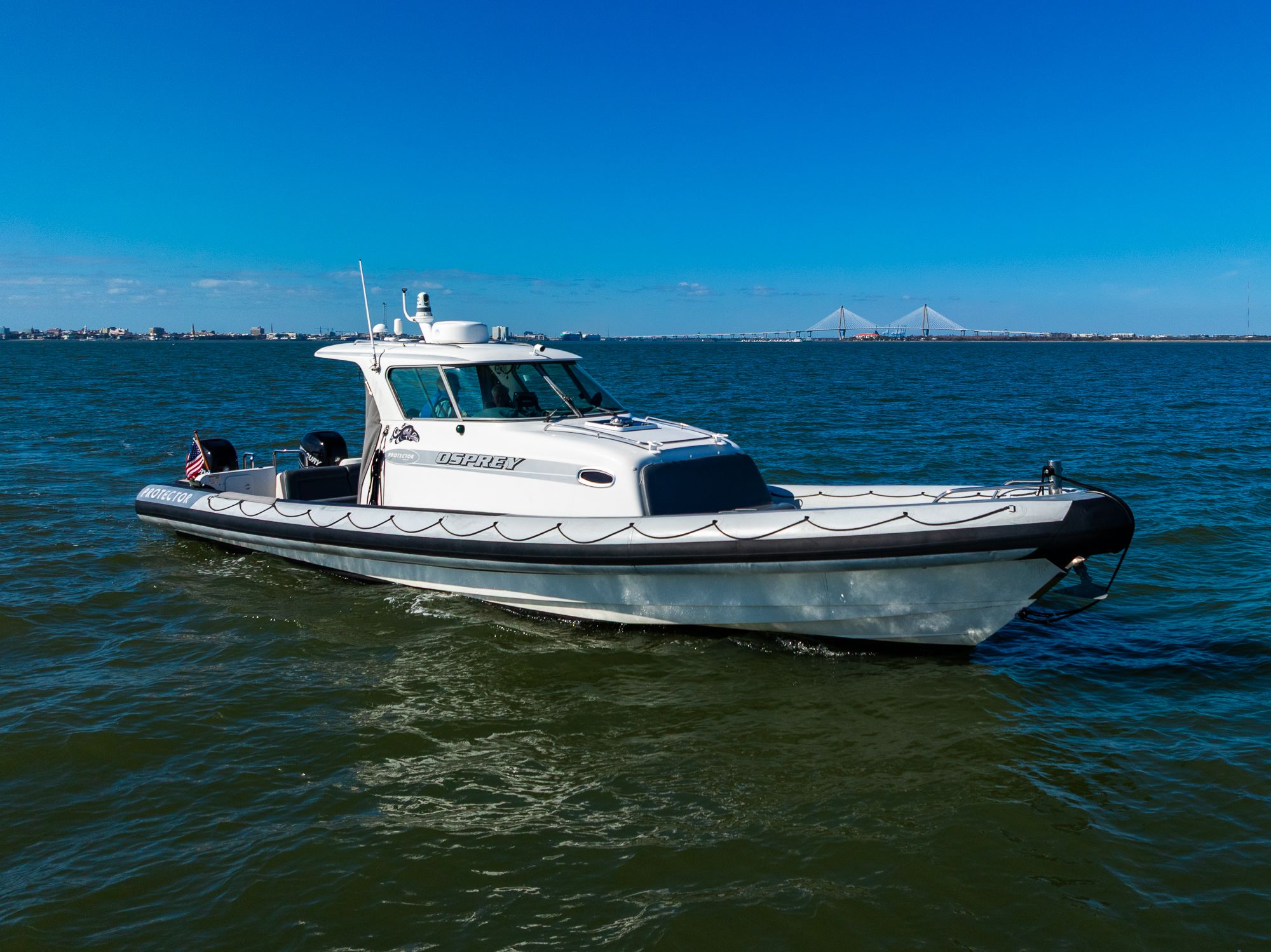 2008 Protector 410 Targa boat on open water.
