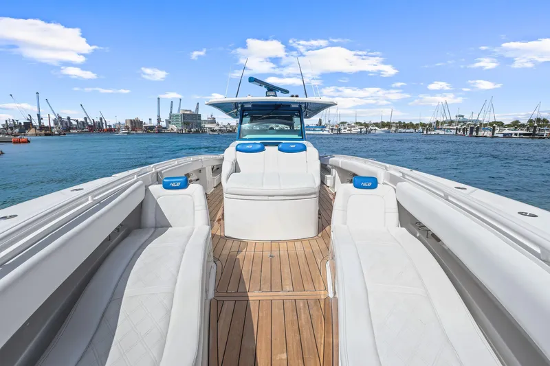 Polar II Yacht Photos Pics Luxury HCB 53 boat interior with white seating, wooden deck, and ocean view, 2020 model.