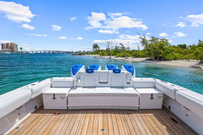 Polar II Yacht Photos Pics Luxury HCB 53 boat with scenic waterfront view, 2020 model, featuring spacious deck and blue skies.