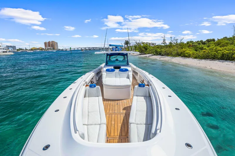 Polar II Yacht Photos Pics Luxury HCB 53 boat docked near a sandy beach, 2020 model.