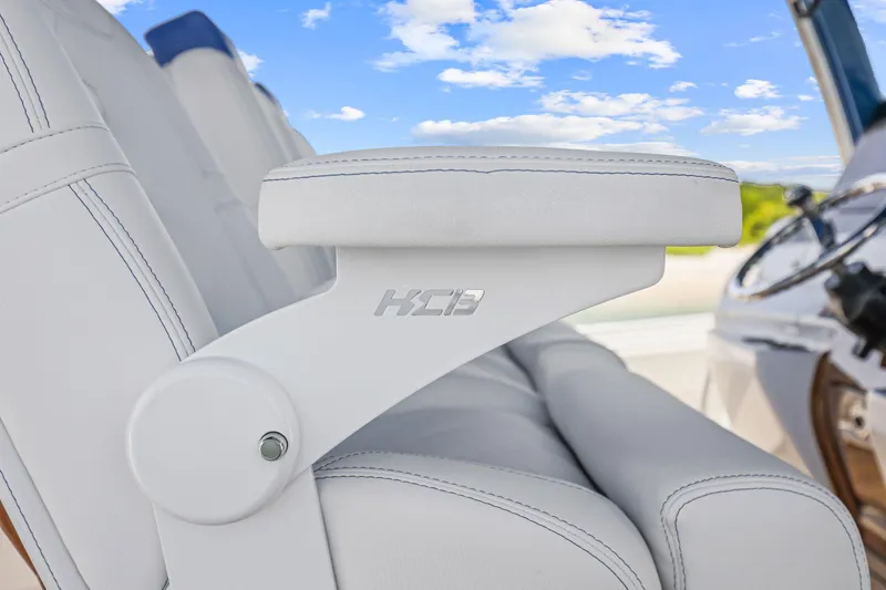 Polar II Yacht Photos Pics Luxury seating on 2020 HCB 53 boat with white upholstery and blue sky background.