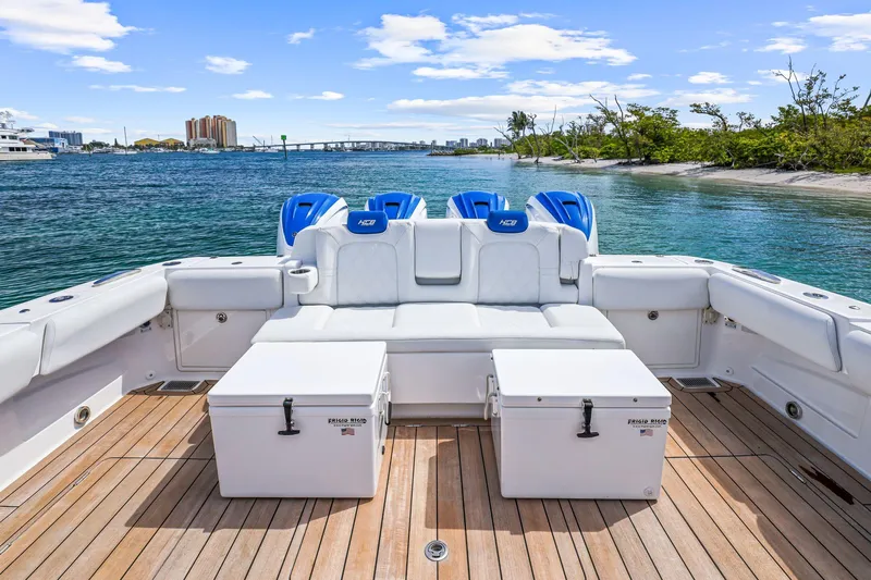 Polar II Yacht Photos Pics Luxury HCB 53 boat deck with seating and coolers, 2020 model, on calm water.