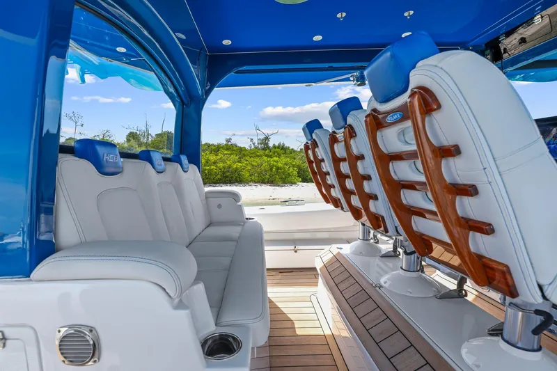 Polar II Yacht Photos Pics Luxurious interior of 2020 HCB 53 boat with plush seating and wooden accents.