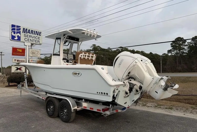  Yacht Photos Pics 2026 Sea Hunt Gamefish 25 boat on trailer at Marine Service Center.