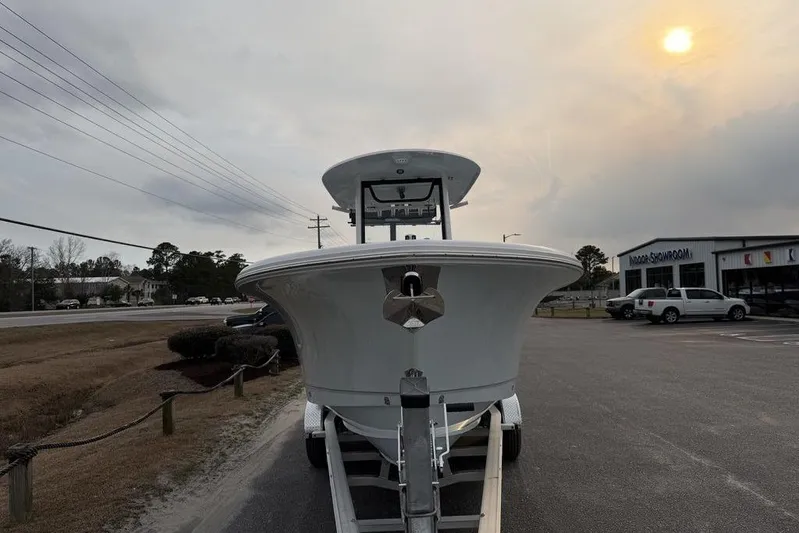  Yacht Photos Pics 2026 Sea Hunt Gamefish 25 boat on trailer, outdoor showroom, overcast sky.