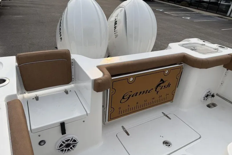  Yacht Photos Pics 2026 Sea Hunt Gamefish 25 boat interior with seating and storage compartments.