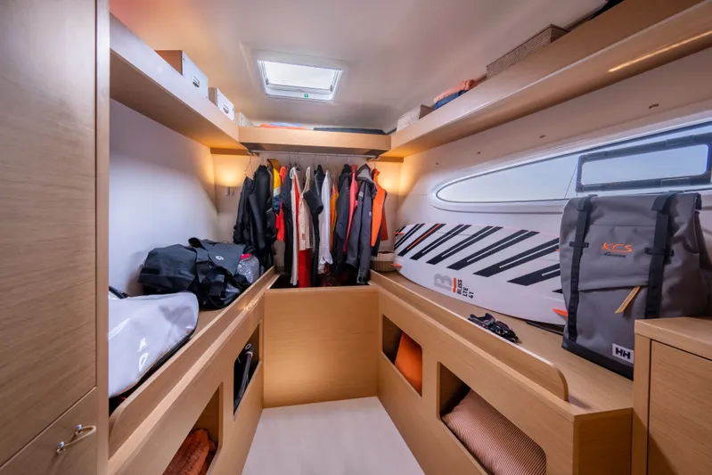 Tbd Yacht Photos Pics Interior of Excess EXCESS 14 yacht, 2026 model, featuring storage and clothing.