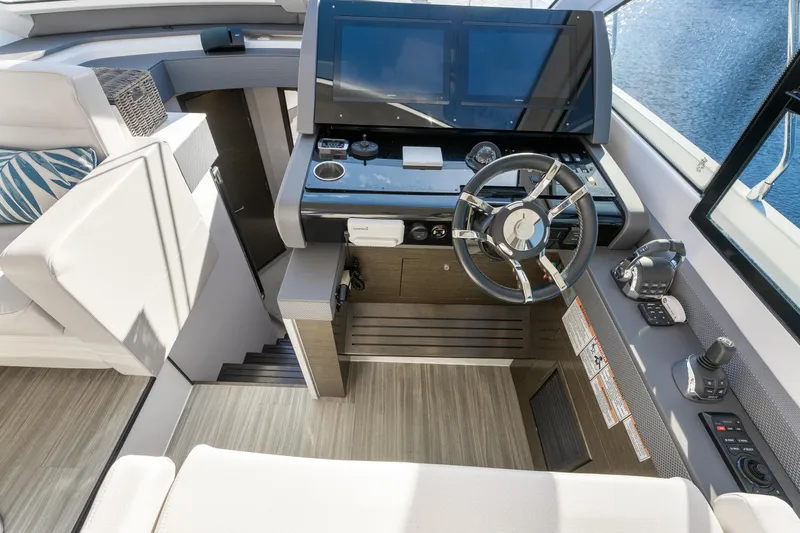 Lil' Darlin' Yacht Photos Pics 2018 Cruisers Yachts 50 Cantius helm with modern controls and sleek design.
