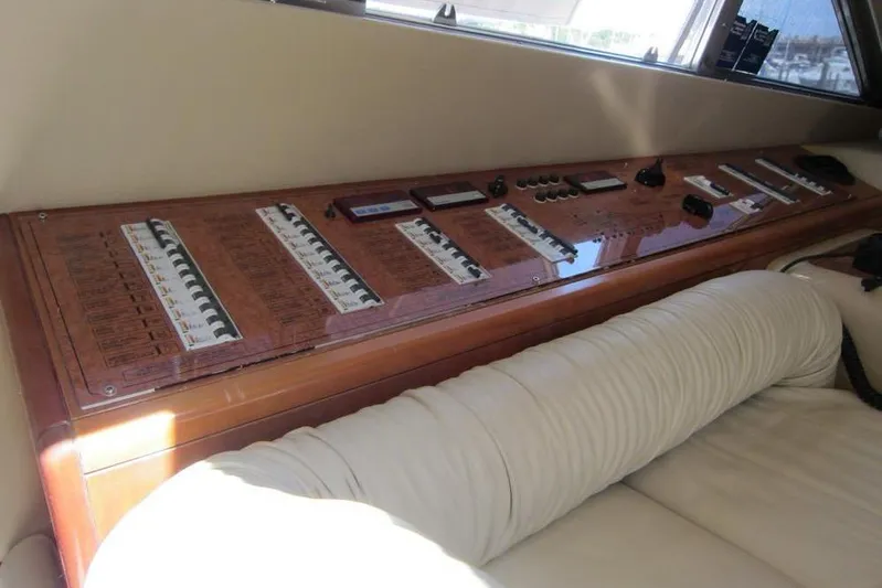  Yacht Photos Pics Control panel of a 2002 Ferretti Yachts 430, featuring switches and gauges.
