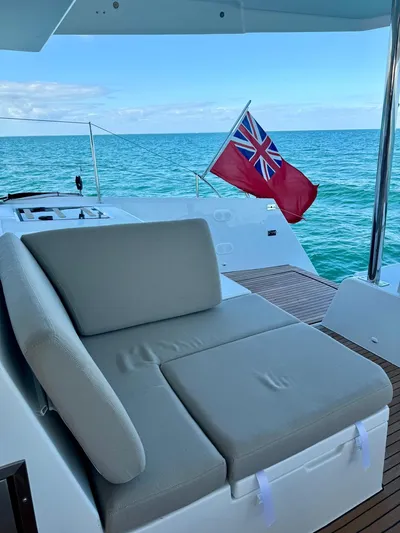  Yacht Photos Pics 2024 Fountaine Pajot Catamaran Elba 45 with comfortable seating and ocean view.