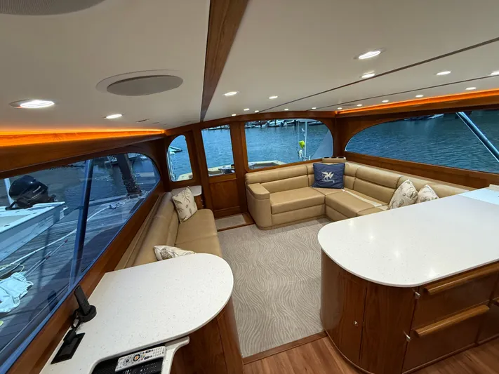 Gryphon Yacht Photos Pics Luxurious interior of 2002 Custom Carolina Ritchie Howell yacht with elegant seating and modern design.