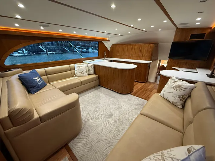 Gryphon Yacht Photos Pics Luxurious 2002 Custom Carolina Ritchie Howell yacht interior with plush seating and elegant wood finishes.