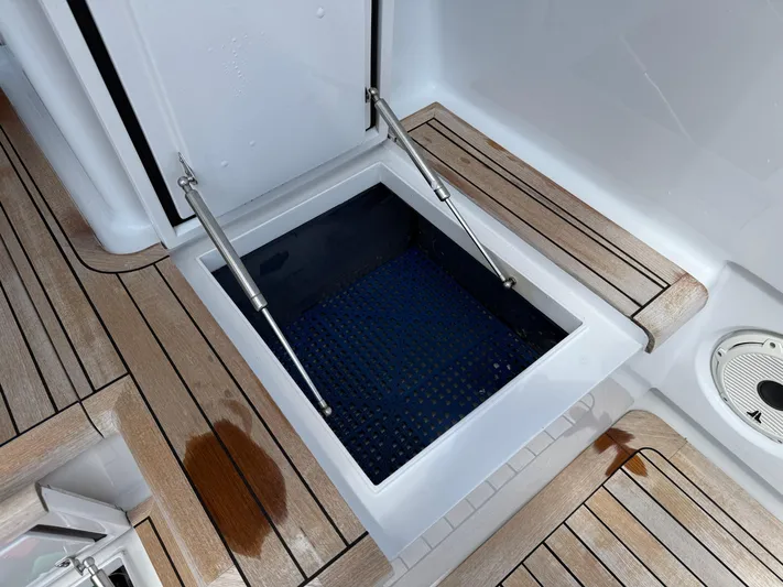 Gryphon Yacht Photos Pics Open hatch on 2002 Custom Carolina Ritchie Howell boat with teak flooring.
