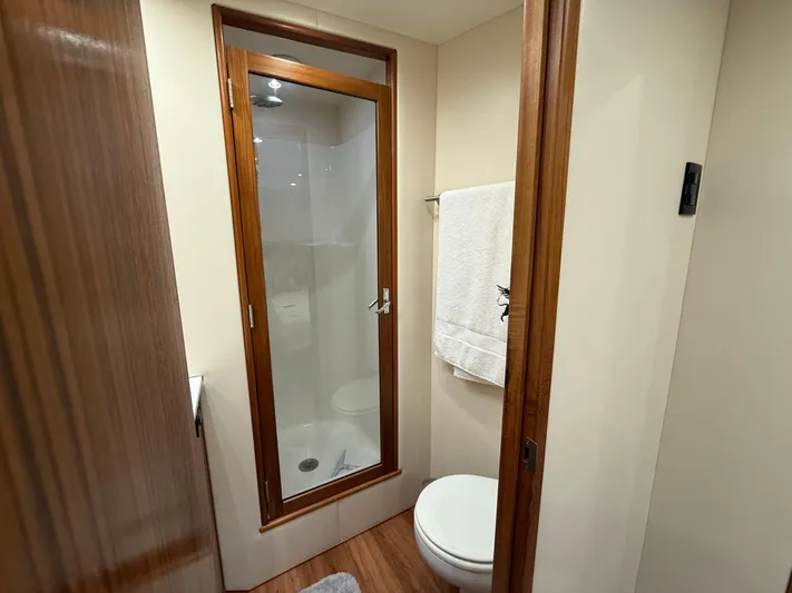 Gryphon Yacht Photos Pics Bathroom interior of 2002 Custom Carolina Ritchie Howell yacht with shower and toilet.