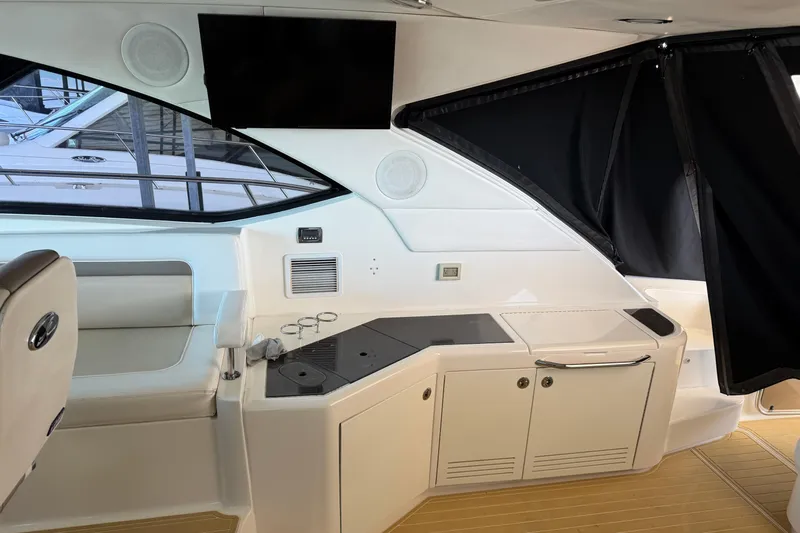  Yacht Photos Pics Interior of 2014 Sea Ray 540 Sundancer yacht with modern seating and cabinetry.