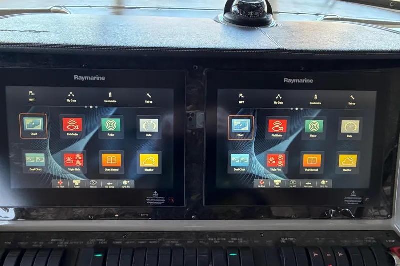  Yacht Photos Pics Raymarine navigation screens on 2014 Sea Ray 540 Sundancer yacht dashboard.