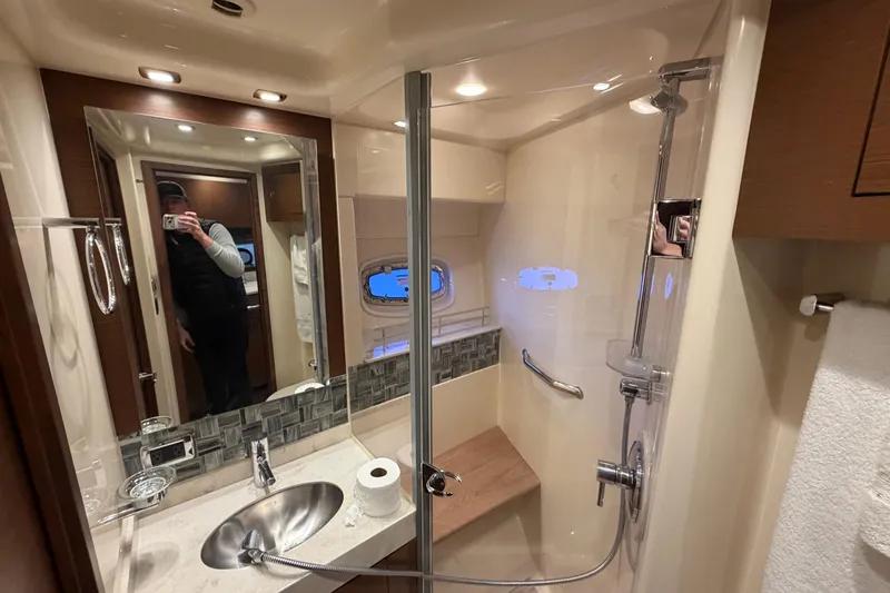  Yacht Photos Pics Luxurious bathroom in 2014 Sea Ray 540 Sundancer yacht with modern fixtures and shower.