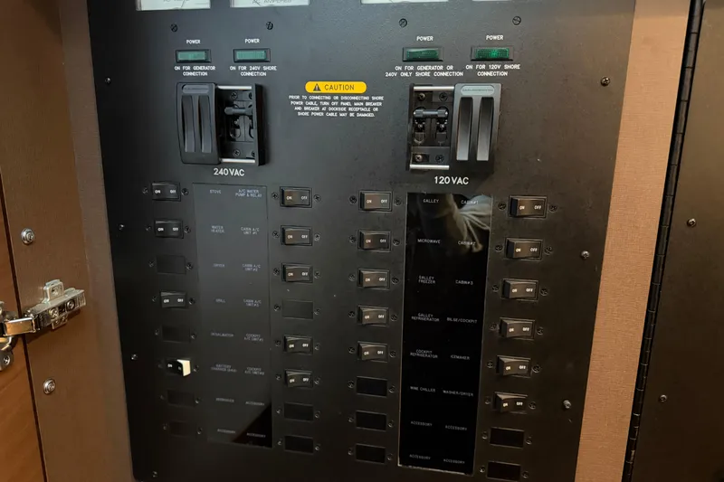  Yacht Photos Pics Electrical panel of a 2014 Sea Ray 540 Sundancer yacht, showing 240VAC and 120VAC switches.