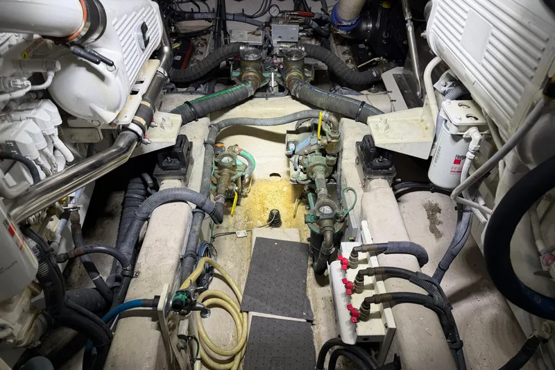  Yacht Photos Pics Engine room of 2014 Sea Ray 540 Sundancer yacht, showcasing mechanical components and systems.