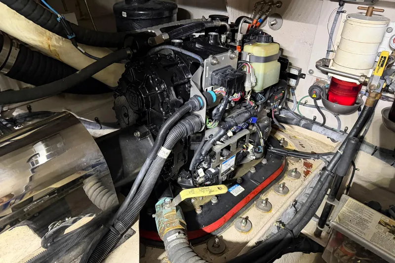  Yacht Photos Pics Engine compartment of a 2014 Sea Ray 540 Sundancer with visible wiring and components.