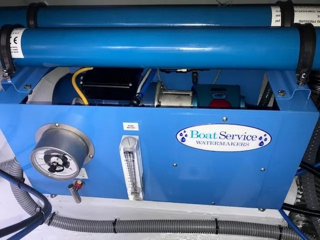 Petalida Yacht Photos Pics Boat Service watermaker system in a 2017 Lagoon 42 catamaran, featuring blue components and gauges.