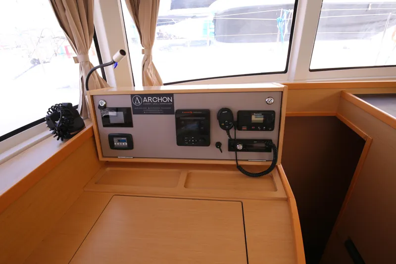 Petalida Yacht Photos Pics Control panel of a 2017 Lagoon 42 catamaran with navigation equipment and radio.