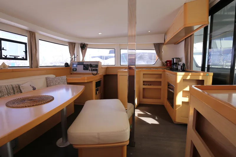 Petalida Yacht Photos Pics Interior of 2017 Lagoon 42 catamaran with modern kitchen and dining area.