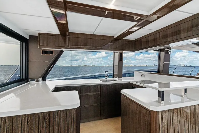 Triple T Yacht Photos Pics Luxurious interior of 2022 Galeon 640 Fly yacht with ocean view.