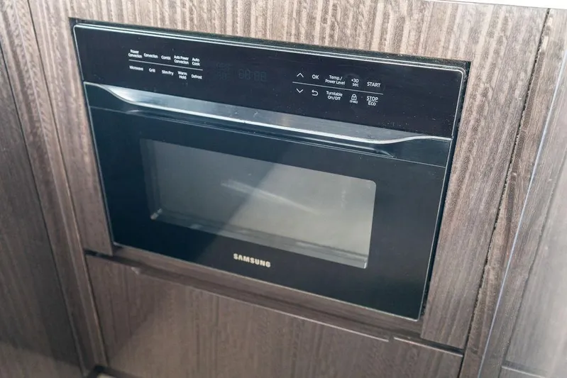 Triple T Yacht Photos Pics Built-in Samsung microwave in 2022 Galeon 640 Fly yacht kitchen.