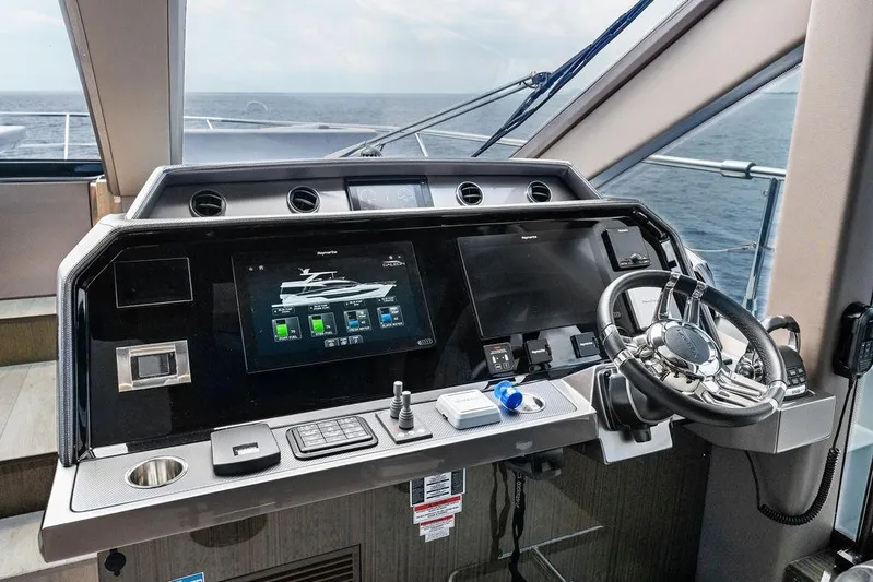 Triple T Yacht Photos Pics Control panel of 2022 Galeon 640 Fly yacht with modern navigation system.