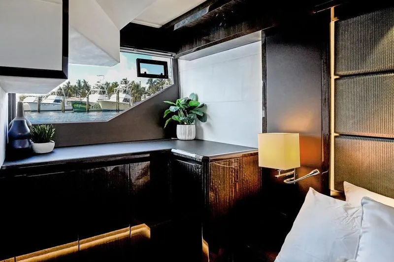Triple T Yacht Photos Pics Luxurious interior of 2022 Galeon 640 Fly yacht with modern decor and waterfront view.