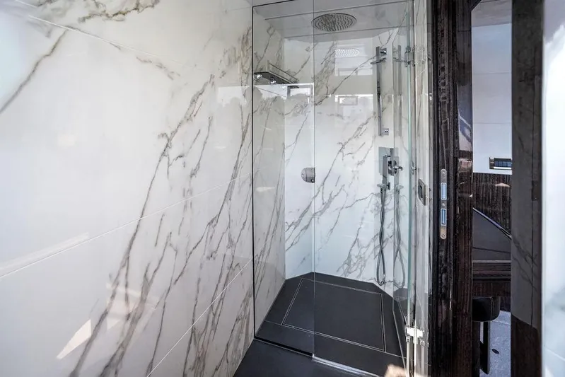 Triple T Yacht Photos Pics Luxurious marble shower in 2022 Galeon 640 Fly yacht bathroom.