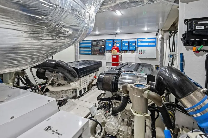 Triple T Yacht Photos Pics Engine room of 2022 Galeon 640 Fly yacht, featuring advanced machinery and control systems.