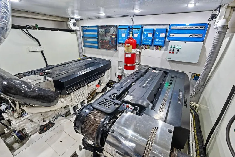 Triple T Yacht Photos Pics Engine room of 2022 Galeon 640 Fly yacht with advanced machinery and control panels.
