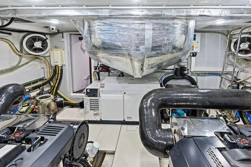 Triple T Yacht Photos Pics Engine room of 2022 Galeon 640 Fly yacht with advanced machinery and ventilation systems.