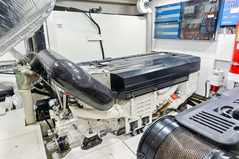 Triple T Yacht Photos Pics Engine room of 2022 Galeon 640 Fly yacht, showcasing advanced machinery and components.