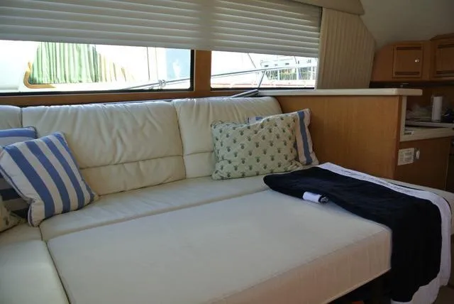 Cabo 43fb Yacht Photos Pics Luxurious interior of 2007 Cabo 43 FB yacht with comfortable seating and stylish decor.