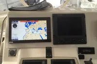 Navigation system on 2007 Cabo 43 FB yacht dashboard with map display.